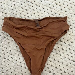 Skims high waist swim bottom